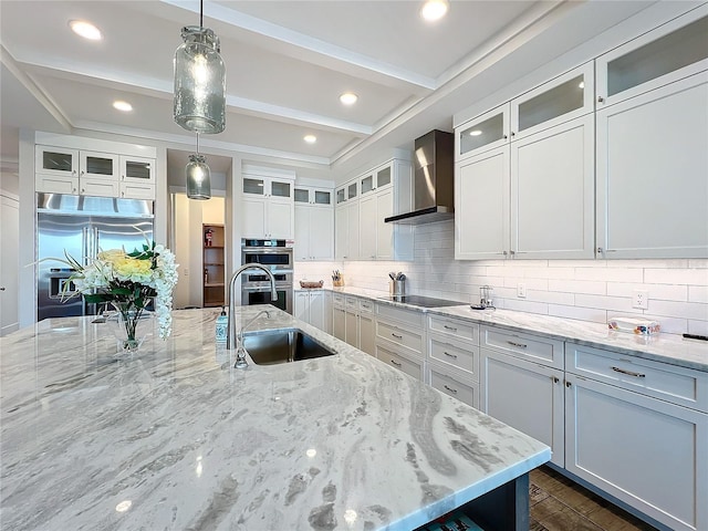 1204 Derby Ln, Sarasota, FL 34242 - kitchen featuring wall chimney exhaust hood, a sink, stainless steel appliances, decorative backsplash, and beam ceiling
