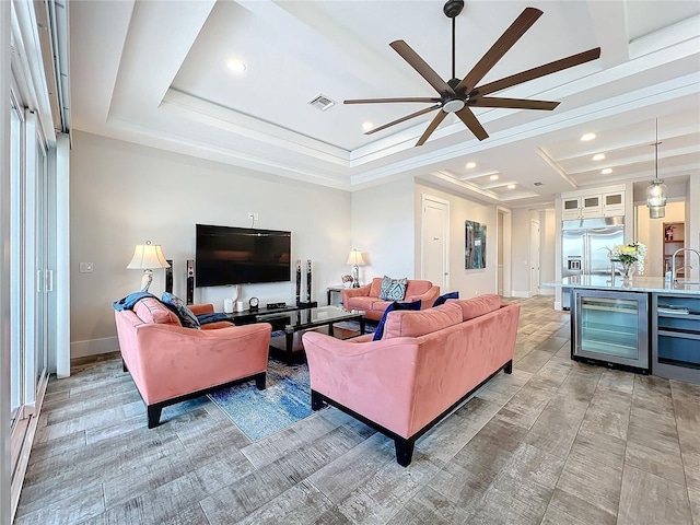1204 Derby Ln, Sarasota, FL 34242 - living room featuring beverage cooler, ceiling fan, recessed lighting, and baseboards