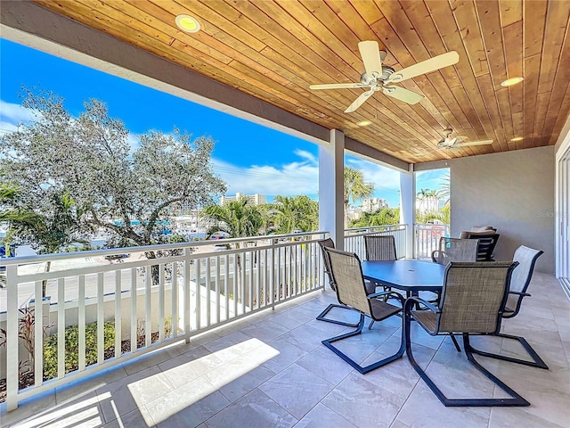 1204 Derby Ln, Sarasota, FL 34242 - view of patio / terrace featuring ceiling fan, a balcony, and outdoor dining area