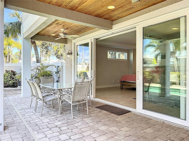 1204 Derby Ln, Sarasota, FL 34242 - view of patio / terrace featuring a ceiling fan and outdoor dining area