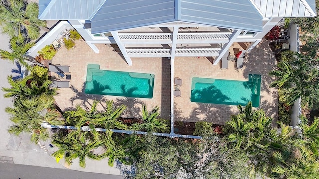 1204 Derby Ln, Sarasota, FL 34242 - view of subject property featuring a pool area