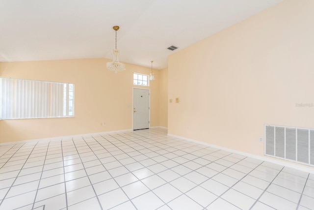 921 Linn Harbor Ct, Tarpon Springs, FL 34689 - unfurnished room featuring a chandelier, vaulted ceiling, and baseboards