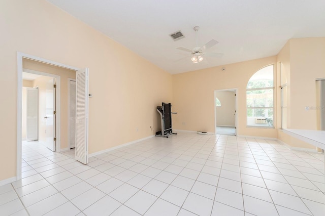 921 Linn Harbor Ct, Tarpon Springs, FL 34689 - empty room featuring a ceiling fan, light tile patterned floors, and baseboards