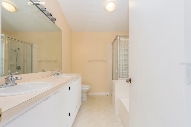 921 Linn Harbor Ct, Tarpon Springs, FL 34689 - full bath with a shower stall, toilet, double vanity, and a bath