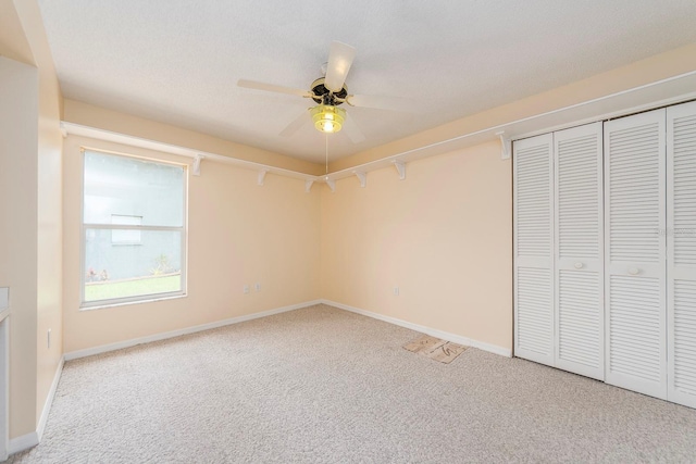 921 Linn Harbor Ct, Tarpon Springs, FL 34689 - unfurnished bedroom with carpet, a closet, and baseboards