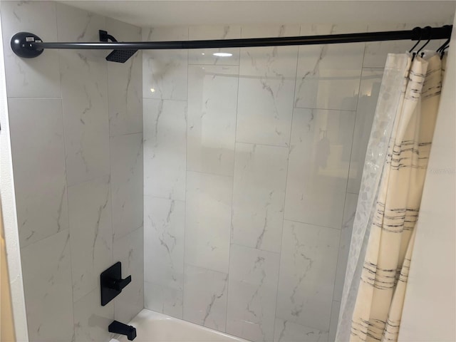 3640 41st Ln S Unit F, Saint Petersburg, FL 33711 - bathroom with shower / bath combo with shower curtain