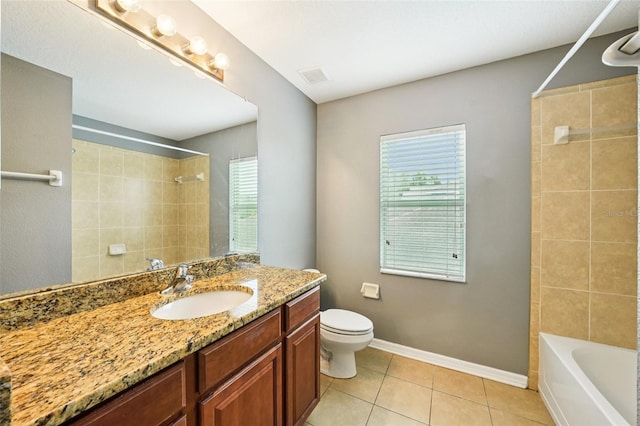 7509 Tangle Bend Dr, Gibsonton, FL 33534 - full bath with vanity, tile patterned floors, plenty of natural light, and shower / bathtub combination