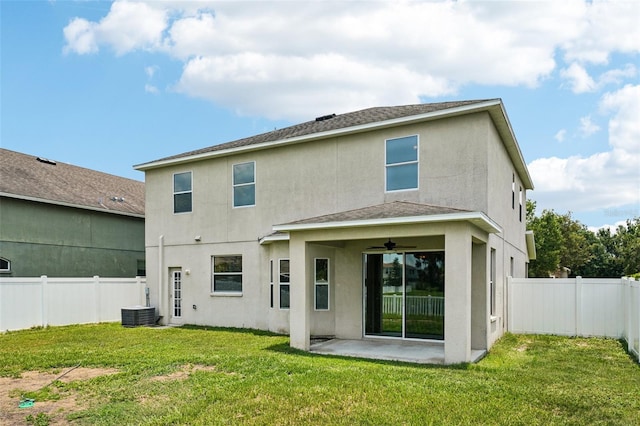 7509 Tangle Bend Dr, Gibsonton, FL 33534 - back of house with a ceiling fan, stucco siding, a patio area, and a fenced backyard