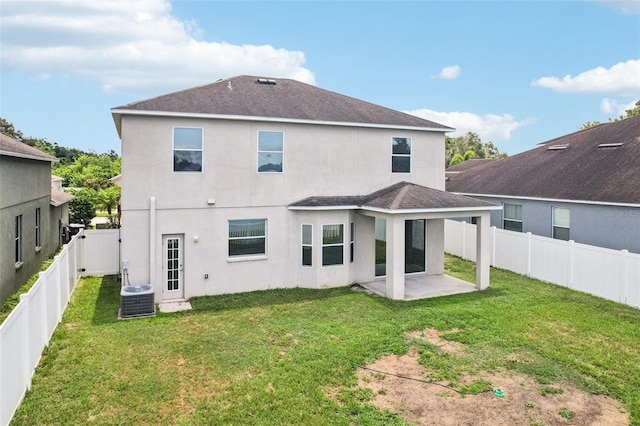 7509 Tangle Bend Dr, Gibsonton, FL 33534 - back of house featuring a patio, stucco siding, a fenced backyard, and roof with shingles