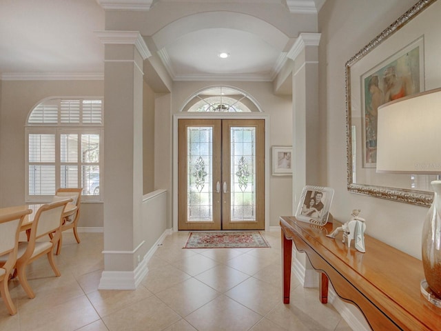 4335 Clairidge Way, Palm Harbor, FL 34685 - entryway with french doors, decorative columns, crown molding, and healthy amount of natural light