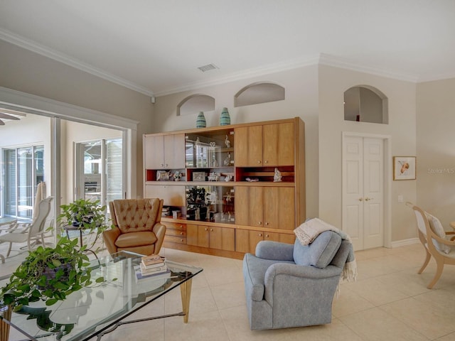 4335 Clairidge Way, Palm Harbor, FL 34685 - living room featuring ornamental molding and light tile patterned floors