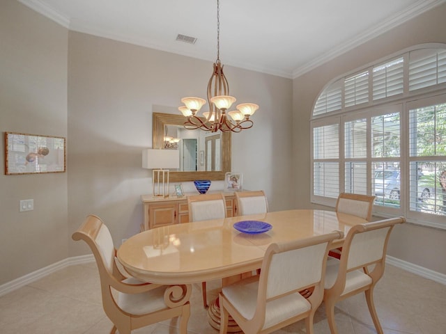 4335 Clairidge Way, Palm Harbor, FL 34685 - dining area featuring a chandelier, crown molding, and light tile patterned floors