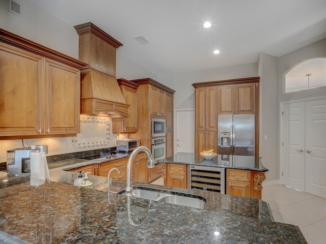 4335 Clairidge Way, Palm Harbor, FL 34685 - kitchen featuring stainless steel appliances, wine cooler, dark stone countertops, light tile patterned floors, and backsplash