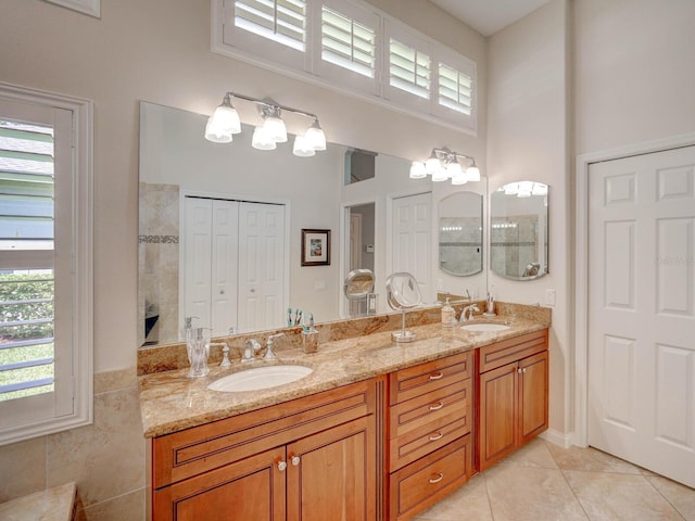 4335 Clairidge Way, Palm Harbor, FL 34685 - full bathroom with tile patterned floors, double vanity, and a high ceiling