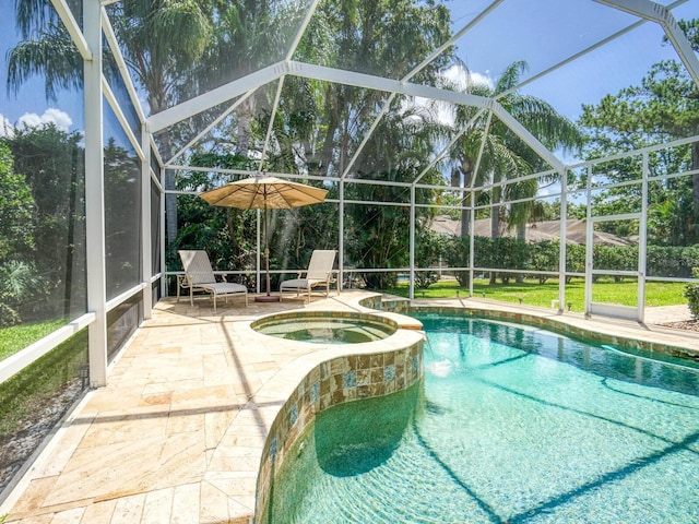 4335 Clairidge Way, Palm Harbor, FL 34685 - view of swimming pool featuring a lanai, a patio area, and a pool with connected hot tub
