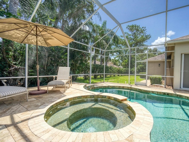 4335 Clairidge Way, Palm Harbor, FL 34685 - view of swimming pool featuring a patio area, a pool with connected hot tub, and glass enclosure