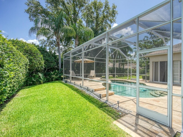 4335 Clairidge Way, Palm Harbor, FL 34685 - swimming pool with a lanai, a lawn, and a patio