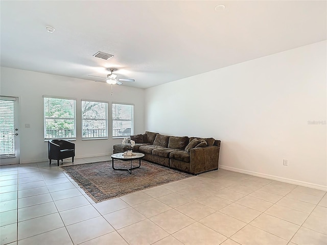 4567 Tuscan Loon Dr, Tampa, FL 33619 - living room featuring light tile patterned flooring and ceiling fan