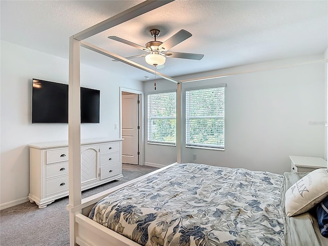 4567 Tuscan Loon Dr, Tampa, FL 33619 - bedroom with light colored carpet, a textured ceiling, and a ceiling fan