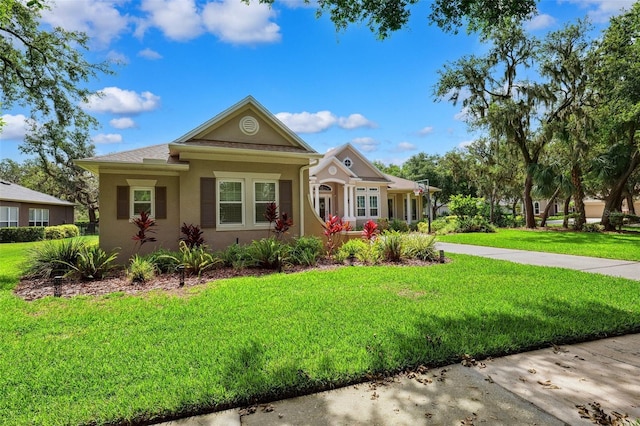 5823 Terncrest Dr, Lithia, FL 33547 - view of front facade featuring a front lawn and stucco siding