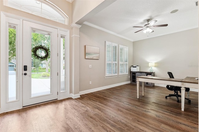5823 Terncrest Dr, Lithia, FL 33547 - office featuring crown molding, wood finished floors, healthy amount of natural light, and a ceiling fan