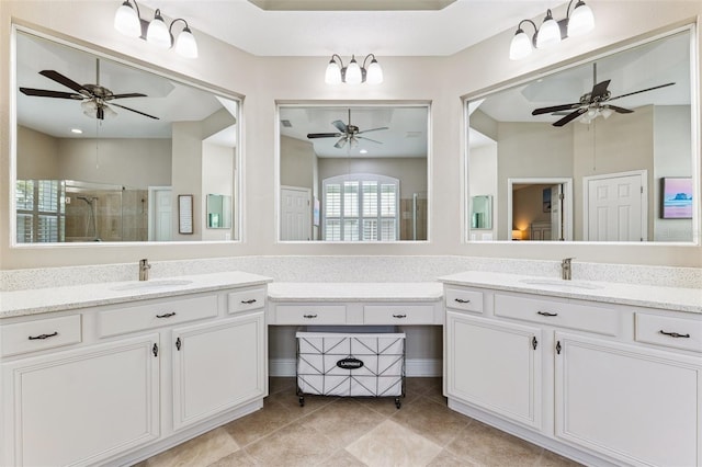 5823 Terncrest Dr, Lithia, FL 33547 - bathroom featuring a ceiling fan, a stall shower, vanity, and tile patterned floors