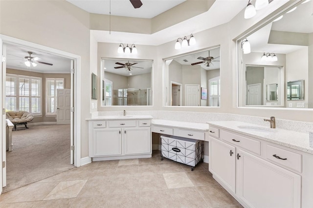 5823 Terncrest Dr, Lithia, FL 33547 - bathroom featuring ceiling fan, a stall shower, vanity, and tile patterned floors