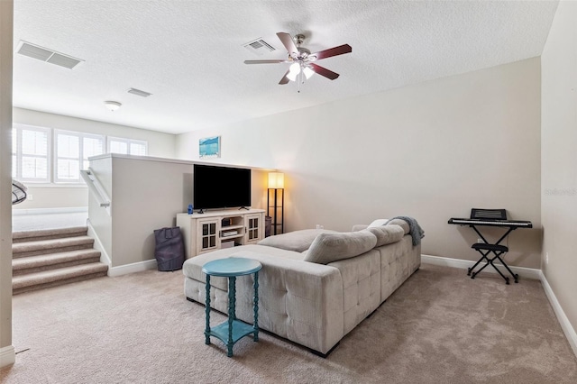5823 Terncrest Dr, Lithia, FL 33547 - carpeted living room with ceiling fan and a textured ceiling