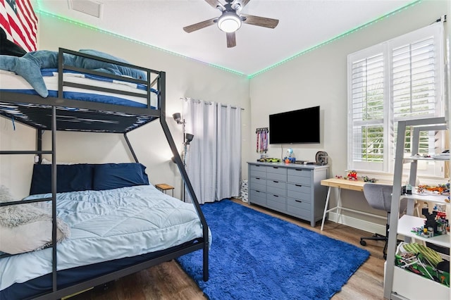 5823 Terncrest Dr, Lithia, FL 33547 - bedroom featuring wood finished floors, a desk, and ceiling fan