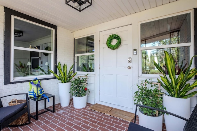 19209 Crooked Ln, Lutz, FL 33548 - property entrance with covered porch and brick siding