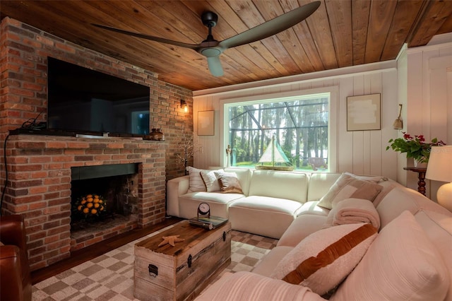 19209 Crooked Ln, Lutz, FL 33548 - living area with wooden ceiling, a ceiling fan, a brick fireplace, and wood finished floors