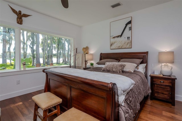 19209 Crooked Ln, Lutz, FL 33548 - bedroom with wood finished floors and a ceiling fan
