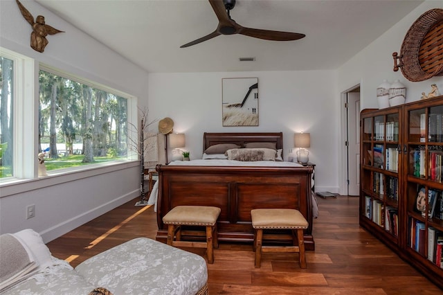 19209 Crooked Ln, Lutz, FL 33548 - bedroom featuring wood finished floors and a ceiling fan