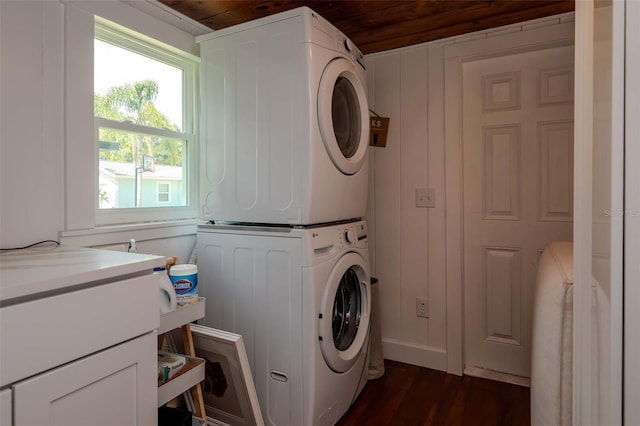 19209 Crooked Ln, Lutz, FL 33548 - laundry room with estacked washer and dryer, wood ceiling, and dark wood-style flooring