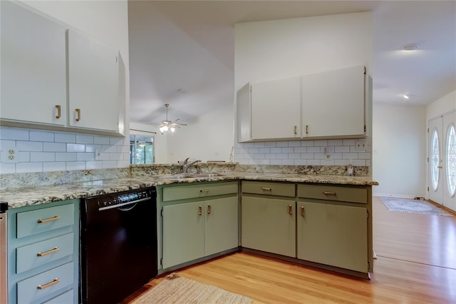 17631 Grove View Dr, Lutz, FL 33549 - kitchen featuring dishwasher, light wood-style floors, tasteful backsplash, and a ceiling fan