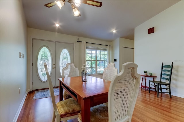 17631 Grove View Dr, Lutz, FL 33549 - dining room featuring a ceiling fan and light wood-type flooring
