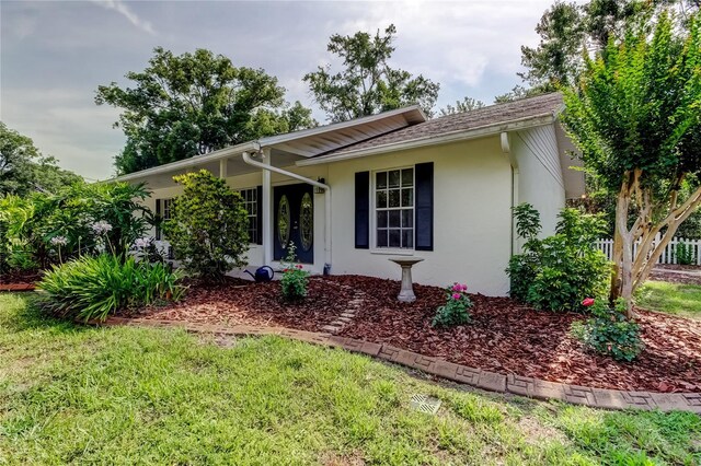 17631 Grove View Dr, Lutz, FL 33549 - single story home featuring stucco siding and a front lawn