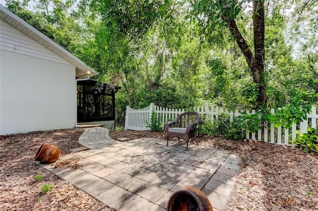 17631 Grove View Dr, Lutz, FL 33549 - view of patio / terrace with a sunroom