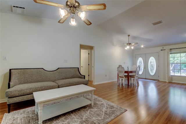 17631 Grove View Dr, Lutz, FL 33549 - living area featuring ceiling fan, wood finished floors, and high vaulted ceiling