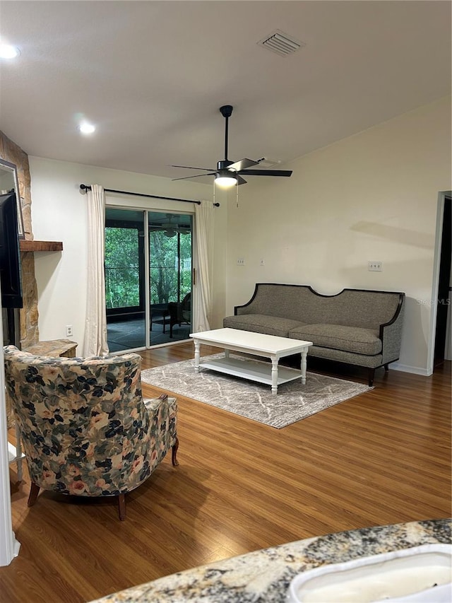 17631 Grove View Dr, Lutz, FL 33549 - living room with wood finished floors, ceiling fan, and recessed lighting