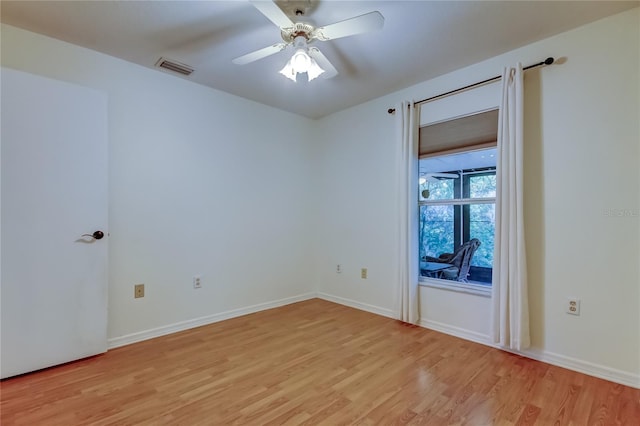 17631 Grove View Dr, Lutz, FL 33549 - empty room with light wood-type flooring and a ceiling fan