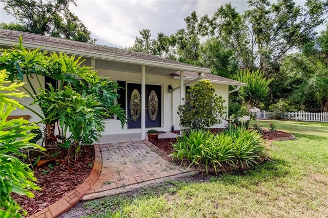 17631 Grove View Dr, Lutz, FL 33549 - entrance to property with stucco siding