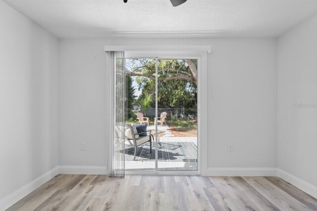 6442 Sutherland Ave, New Port Richey, FL 34653 - unfurnished room featuring wood finished floors and a ceiling fan