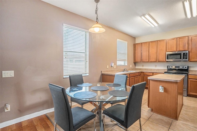 7641 Armonk Ln, Wesley Chapel, FL 33545 - dining space featuring healthy amount of natural light