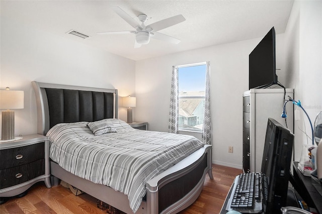 7641 Armonk Ln, Wesley Chapel, FL 33545 - bedroom featuring ceiling fan and wood finished floors