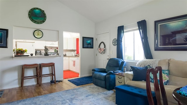 1851 Bough Ave Unit A, Clearwater, FL 33760 - living room with lofted ceiling and wood finished floors