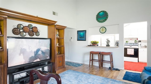 1851 Bough Ave Unit A, Clearwater, FL 33760 - living area featuring a high ceiling and wood finished floors