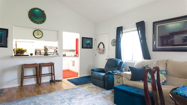 1851 Bough Ave Unit A, Clearwater, FL 33760 - living area featuring lofted ceiling and wood finished floors