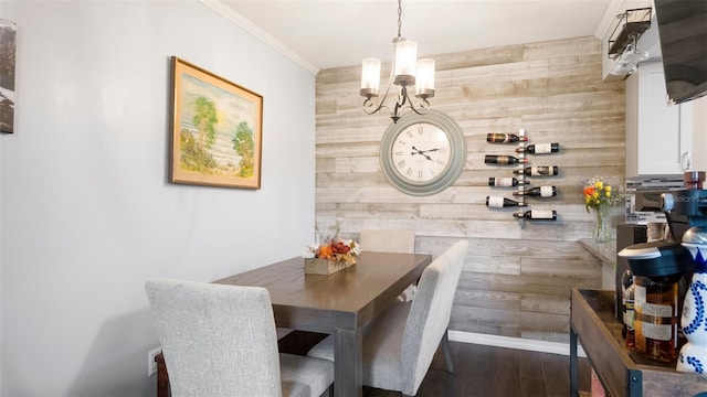 2941 Lichen Ln Unit B, Clearwater, FL 33760 - dining room featuring wood walls, a chandelier, dark wood-style floors, and crown molding