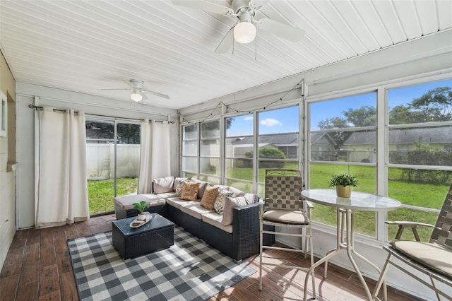 3628 Dellefield St, New Port Richey, FL 34655 - sunroom featuring a ceiling fan and an outdoor living space